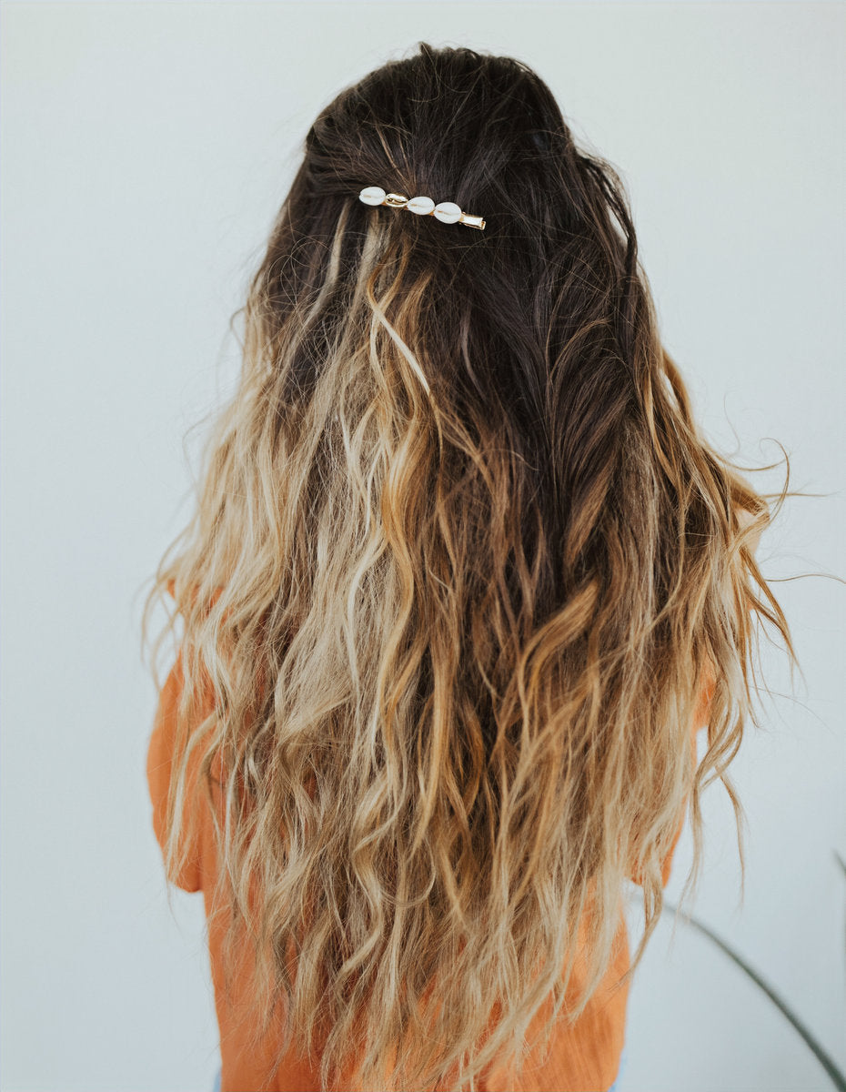 Long blonde balayage hair extensions at Hello Beautiful Signature Salon, Missouri City TX