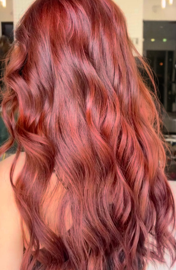 Long copper red hair color at Hello Beautiful Signature Salon, Missouri City TX